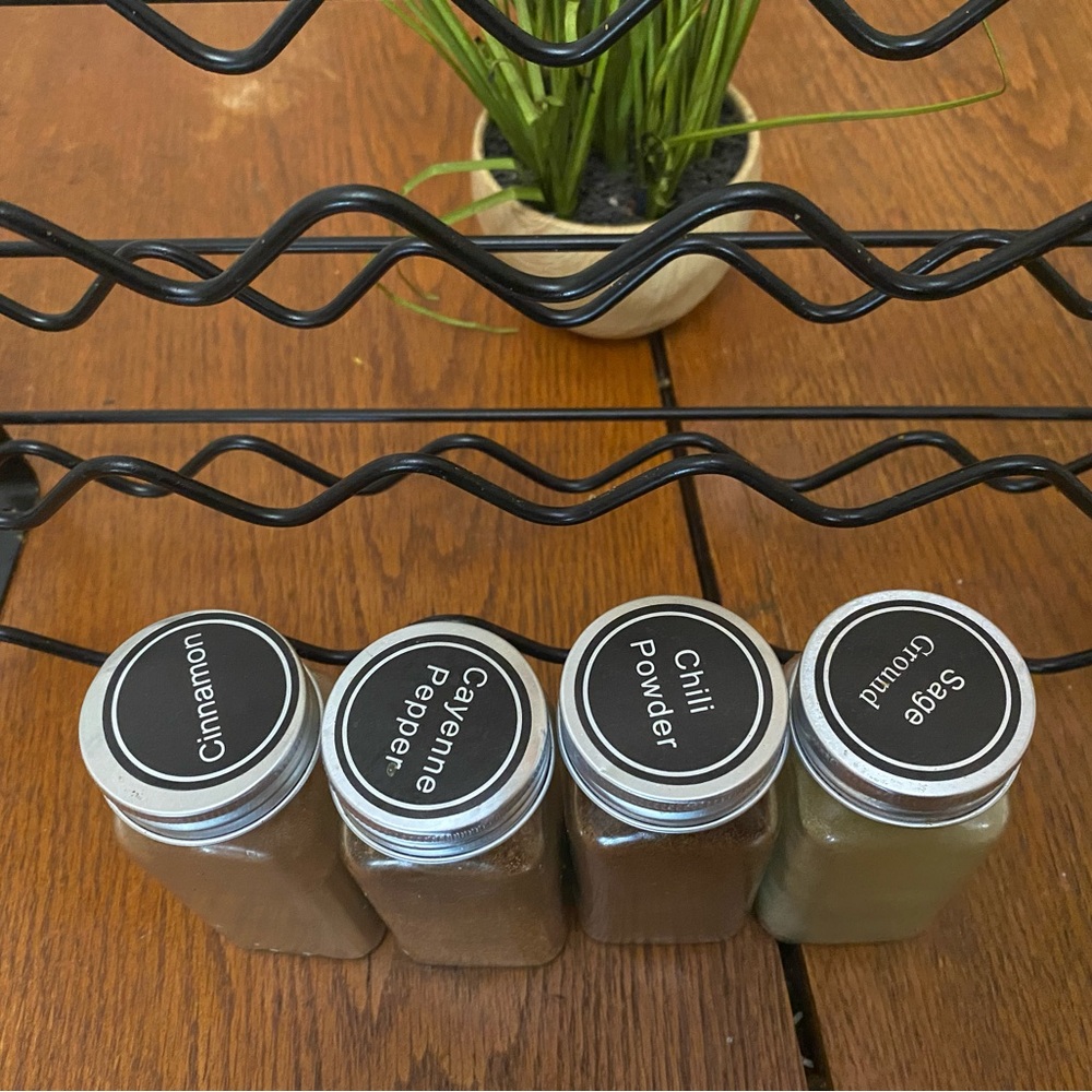 Set of Four Spice Jars with Black Lids